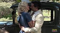 A blonde lady encountered a dangerous man with a gun, and she seduced him with her charm. The man fucked her on his vintage car outside in her sexy lingerie until he finished on her tongue.