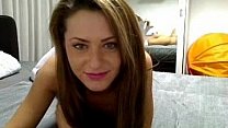 Ultra cute brunette plays with moist pussy on webcam