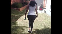 Sexy hot Ebony babe walking dressed in tight leggings