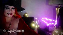 cosplay witch camming with fans for hallowen
