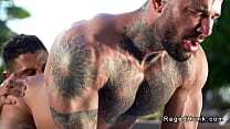 Muscle tattooed hunk Andre Bedford rimming and anal fucking with bottle his lover Danny Starr in the outdoor pool then anal fucking him in bedroom