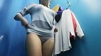 Girl with big tits change clothes. Dress room