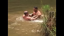 Two horny soldiers having hardcore sex near the lake