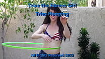 Youthful Trixx shows her flexibilty by working the hula hoop