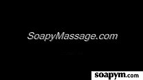 Babe gives erotic soapy massage 17