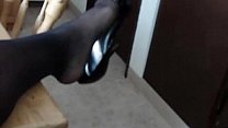 Black pantyhose and heels