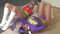 BatGirl trapped in a net