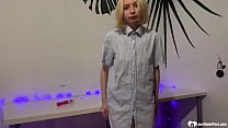 Masseuse takes off her working outfit and plays with her wet cunt while wearing socks.