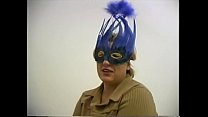Chubby blonde in mask sucks a swinger's cock