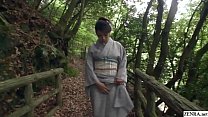 Amazingly beautiful JAV milf Akemi Horiuchi in a kimono flashes her lower body while outdoors in a forest before kneeling to perform a blowjob in HD with English subtitles