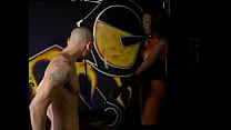 Tied bald guy licks the ass of a busty ebony bitch in the basement