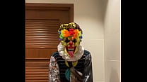 Blonde milf sucks clown dick in bathroom stall