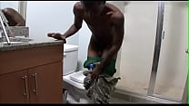 Black man enjoys having a intense masturbation session on the toilet seat until he cums