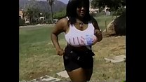 Busty ebony whore with big butt loves to fuck doggy style on a park bench