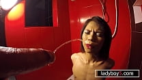Thai teen shemale in bondage pissed in her mouth and sucking dick