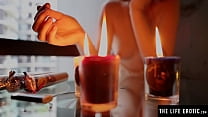 Hot wax gets her aroused as she masturbates to a powerful orgasm