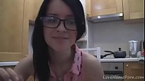 splendid teen with glasses chatting in the kitchen