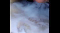 Sexy mexican blows smoke on pussy