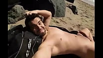 Ian Delvalle sunbathing at a gay nude beach in San Francisco.