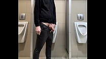 pissing in public toilet of a departmet store with soft dick