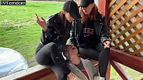 Two Smoking Bitchy Girls Use Submissive Guy Like A Human Ashtray and Human Spittoon Slave On Public