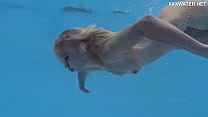 Russian pornstar Emily Ross swims and strips for you