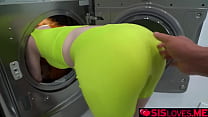 Madi Collins inside the washing machine with legs wide open
