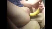 y. toys her wet pussy with banana