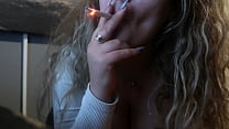 thick blonde smoking while sucks a dildo