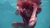 Submerged underwater teen babe gets horny