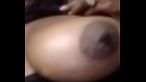 Slim sexy ebony shows tits in car