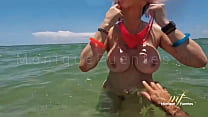 Latina MILF strips naked on a public beach