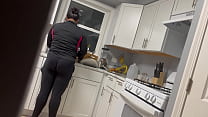 Latina Maid cleaning kitchen