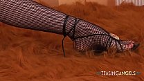 Fishnet stockings look amazing on this cute redhead who loves to tease