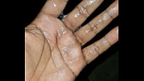 Wet cum filled hands after masturbating