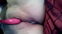 Orgasm in bed with pink dildo