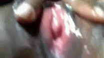 Sexy ass black girl strokes her wet pussy