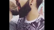 Two gay male kissing each other with full bearn on | gaylavida.com