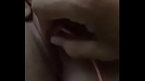 Girl in hotel plays with pussy