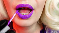 sexual teasing - erotic clip of hot pin up blonde doing lips make up