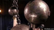 Brunette slut Charlotte Sartre in bondage with huge metal ball on her head and on her hands suffers torment