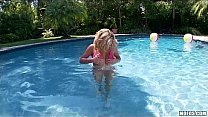 Big-tit bikini clad blonde fist fucks herself by the pool