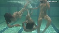 Swimming pool threesome with sexy Russian babes