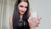 Dominatrix Nika drools and spits into a glass for you to drink. Humiliation of you by Mistress