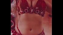 Busty, sexy bellydancer showing off her movements and amazing belly
