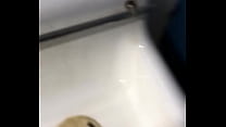 Chinese boy peeing in restroom