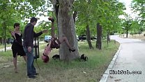 Redhead slave hanged on public tree