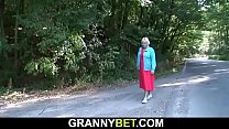 Hitchhiking old blonde granny