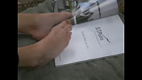 Flipping Through Magazine with Feet