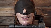 Natural huge tits redhead slave Lauren Phillips is blindfolded and set in metal device bondage and zappered by master The Pope then whipped in doggy